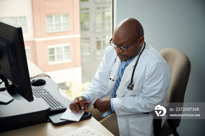 Doctor working on computer