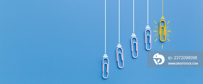 Great ideas concept with paperclip,thinking,creativity,light bulb on blue background,new ideas conce