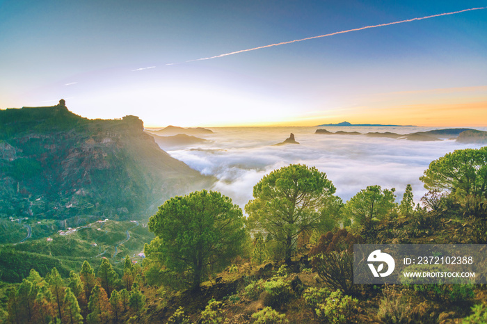 Nature landscape with a beautiful sunset. With views of Tenerife and Mount Teide. With a sea of ​​cl