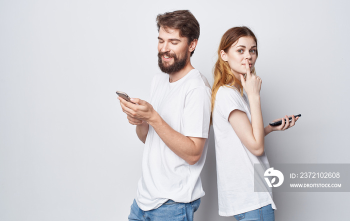 young couple in t-shirts chatting