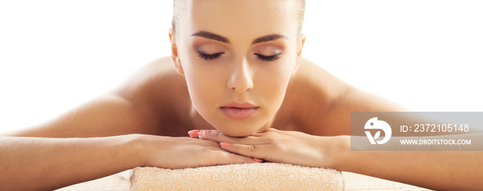 Close-up of young woman in spa. Traditional healing therapy and massaging treatments.