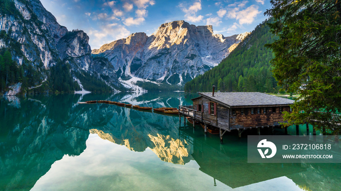 Lake Braies (Lago di Braies) in Dolomites Mountains, Boat hut on Braies Lake with Seekofel mount on 