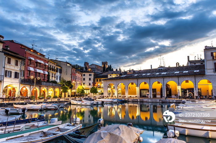 Sunset over marina at Lake Garda in Desenzano, Italy