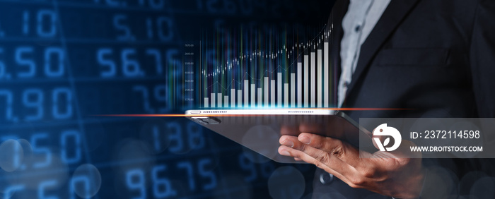 Businessman using tablet with trading graph. stock exchange marketing analyzing chart. information s