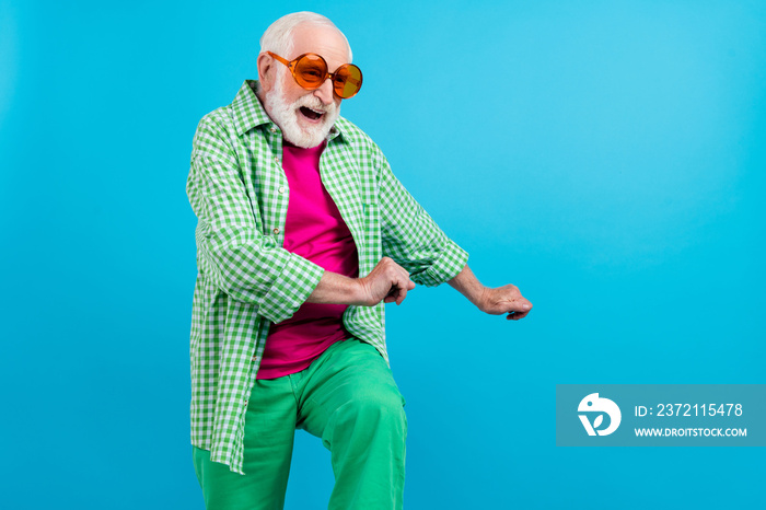 Photo of dreamy cheerful old positive white haired grandpa dance good mood vacation empty space isol