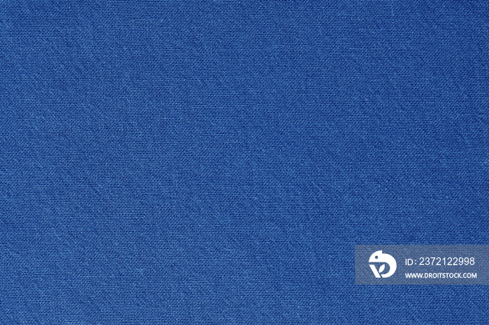 背景为蓝色棉布质地，自然纺织图案。