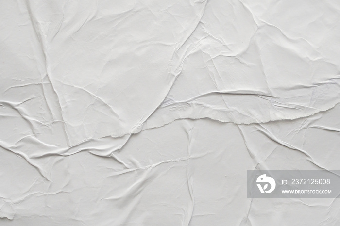 Blank white crumpled and creased paper poster texture background