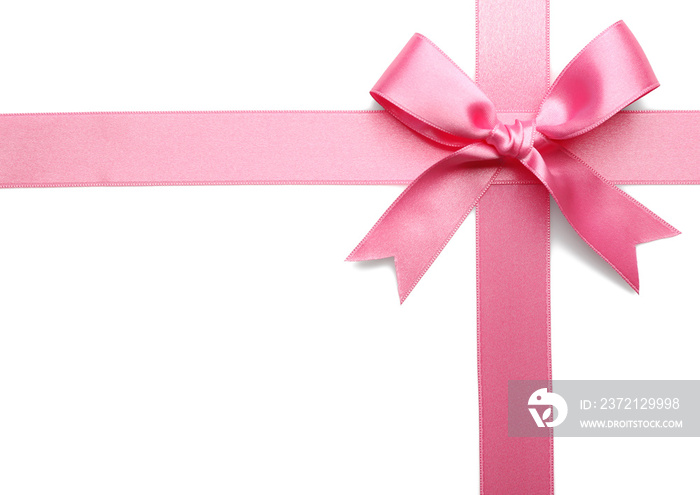 Pink ribbon bow on white background