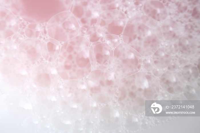 soap bubbles gently pink color. pink soap foam macro background.Bath foam. Lightness and airiness. h