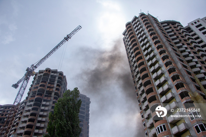 Fire At a construction site, unfinished multi-storey reinforced concrete building