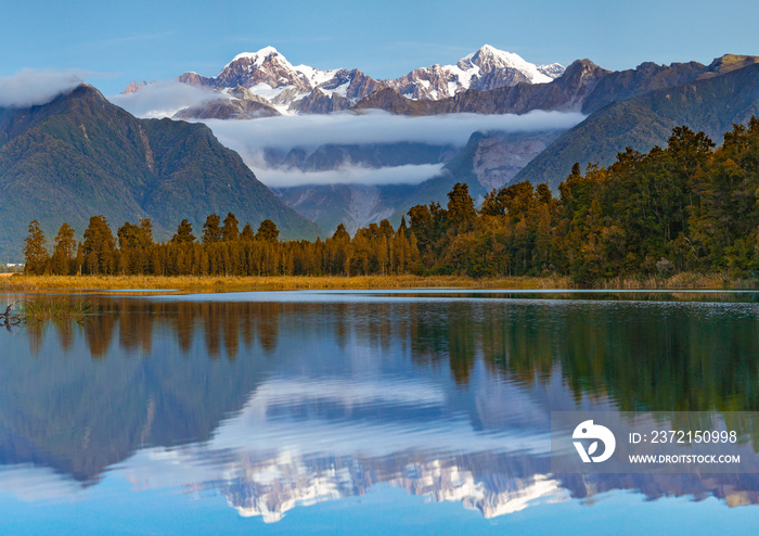 Scenic view of Lake Matheson near the Fox Glacier New Zealand.