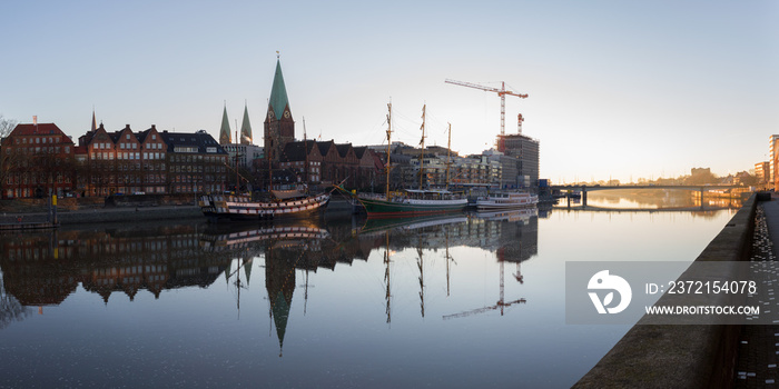 Panorama of Bremen at the Schlachte, St. Petri Dom, ships at sunrise