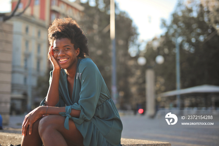 portrait of a smiling woman in the city