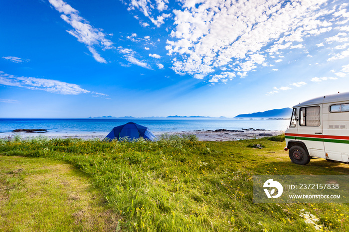 Camper van and tent on beach, Lofoten Norway