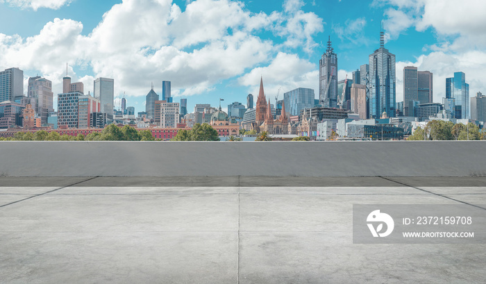 Empty open space top floor with modern skyscraper background