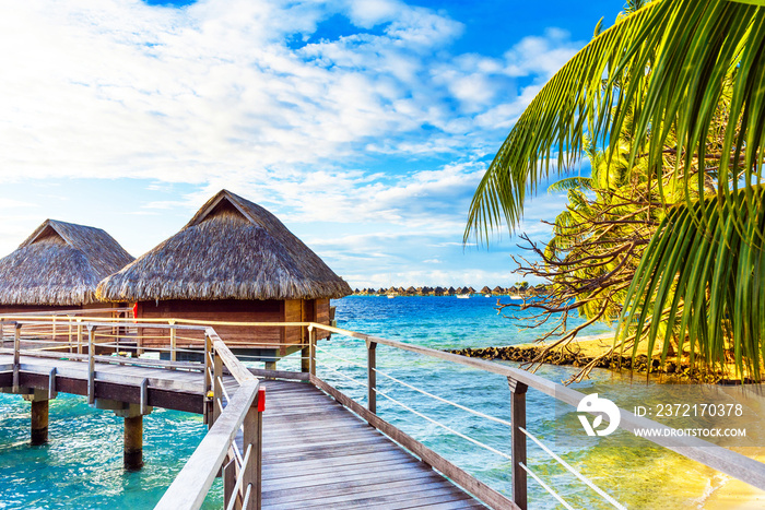 View of the bungalow on the sandy beach, Bora Bora, French Polynesia.