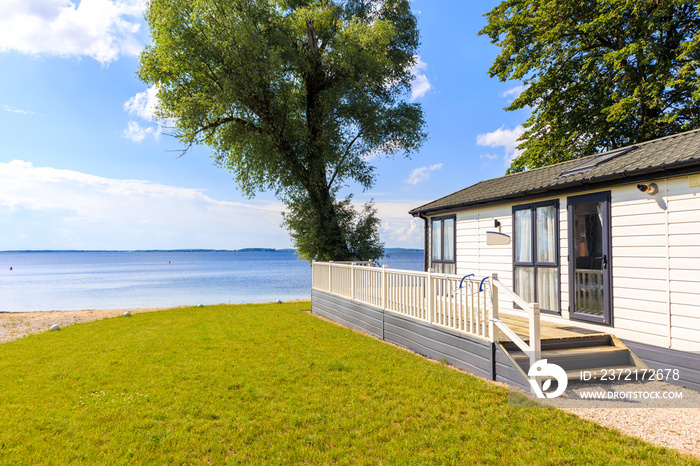 Camping house in sailing port Nowe Guty on Lake Sniardwy on summer sunny day,  Masurian Lakes, Polan