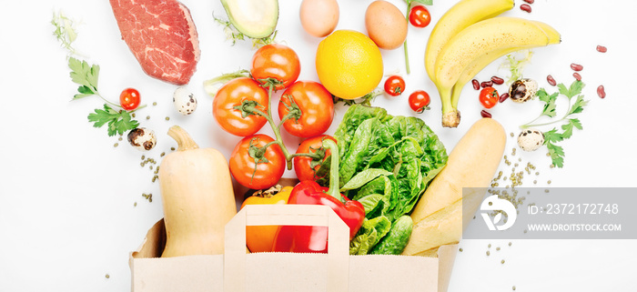 Full paper bag of different health food on white background