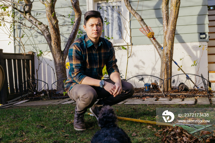 Transgender person in their backyard 