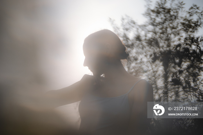 Woman dancing in nature