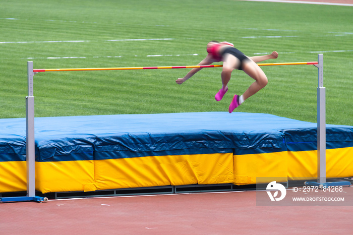 Athletes in high jump competition