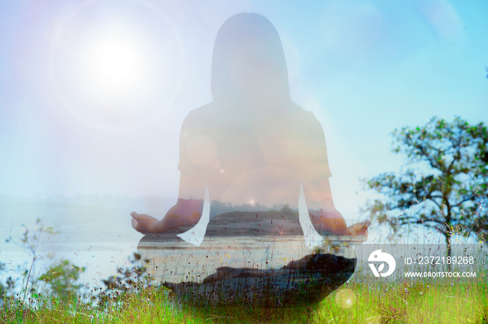 Double exposure of yoga pose landscape with sunrise