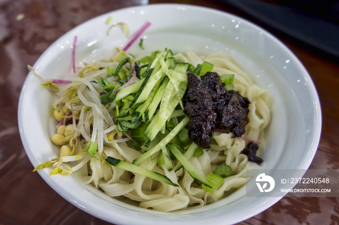 Bowl of Noodles with Soy Bean Paste in Beijing, China