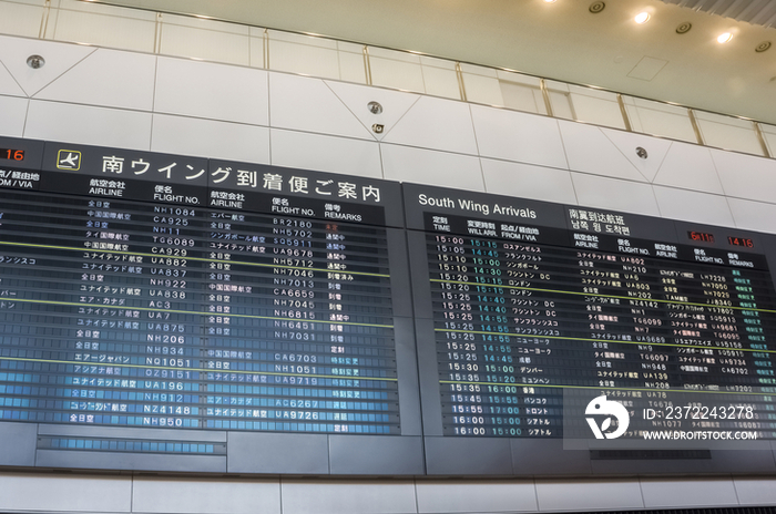 Flight information board in Narita International Airport terminal, Narita, Chiba Prefecture, Japan