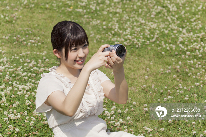 Young woman taking pictures