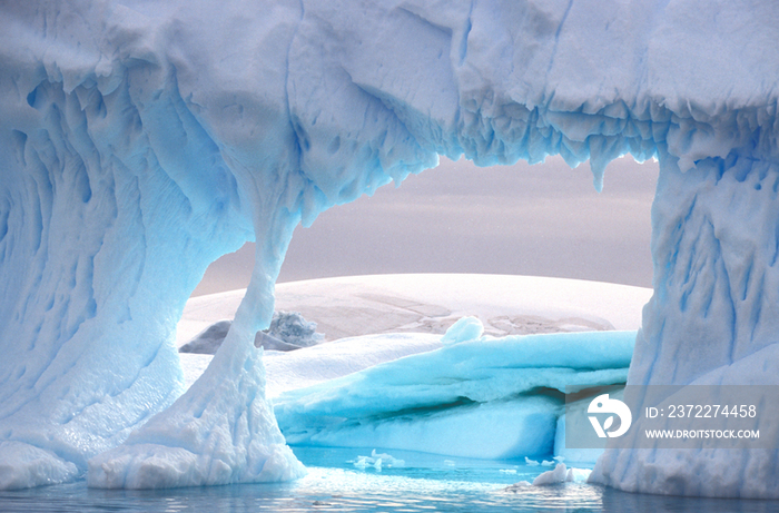 Antarctic Peninsula, Lemaine Canal. A blue iceberg