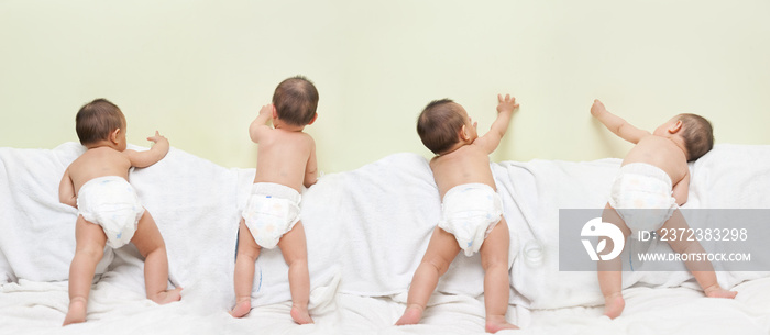 Cute baby standing and playing