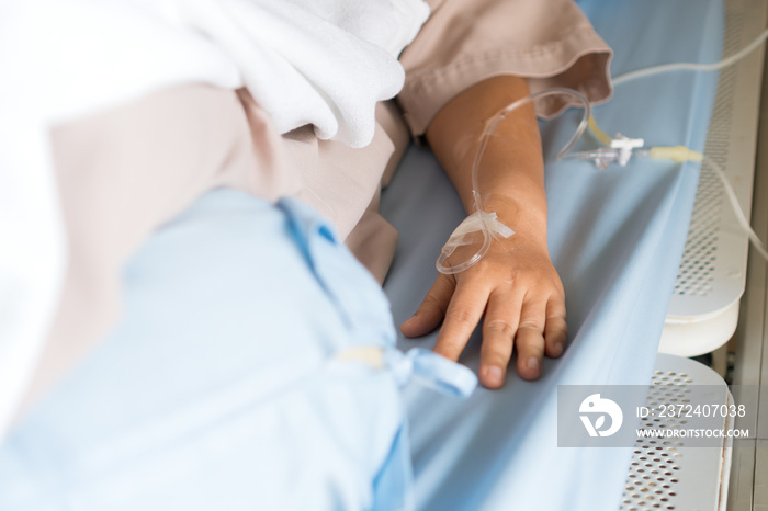 Virus treatment for Patients woman Sleep with hands medical drip intravenous needle, saline Iv drip,