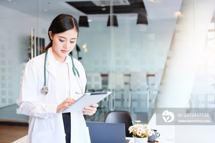 Healthcare technology concept.Woman Doctor Working using a laptop computer contact with patient.