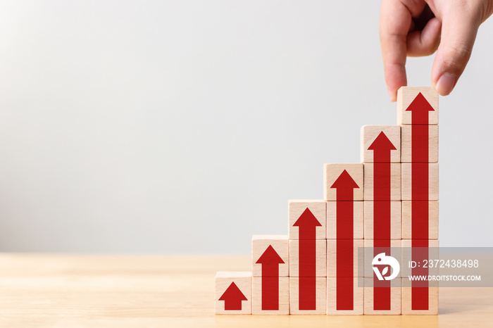 Ladder career path for business growth success process concept.Hand arranging wood block stacking as