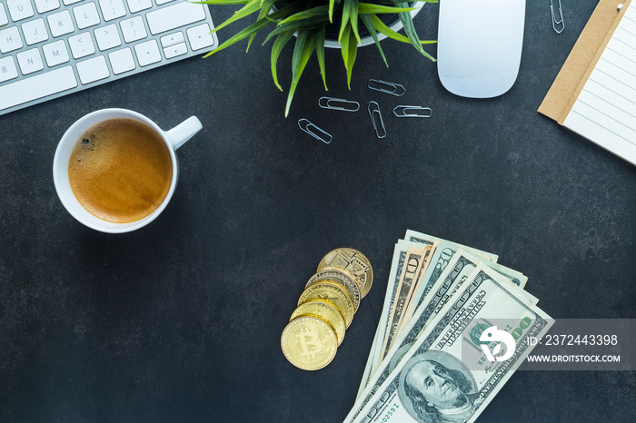 Flat lay top view office desk, bitcoin and dollars money