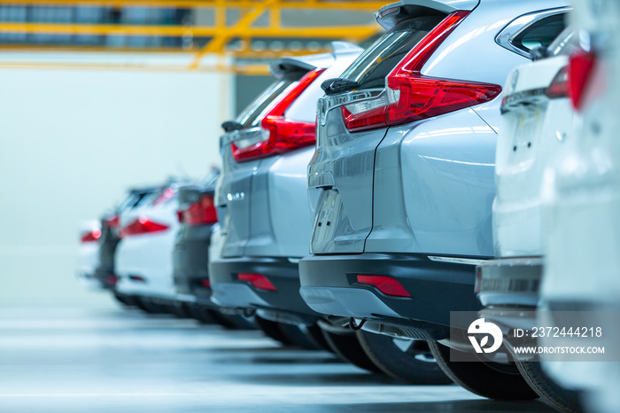 Cars For Sale, Automotive Industry, Cars Dealership Parking Lot. Rows of Brand New Vehicles Awaiting