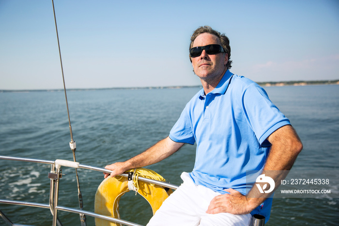 Man relaxing on private yacht