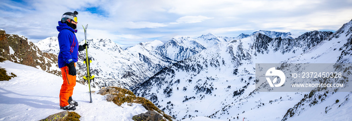 Portrait of a skier in high mountain