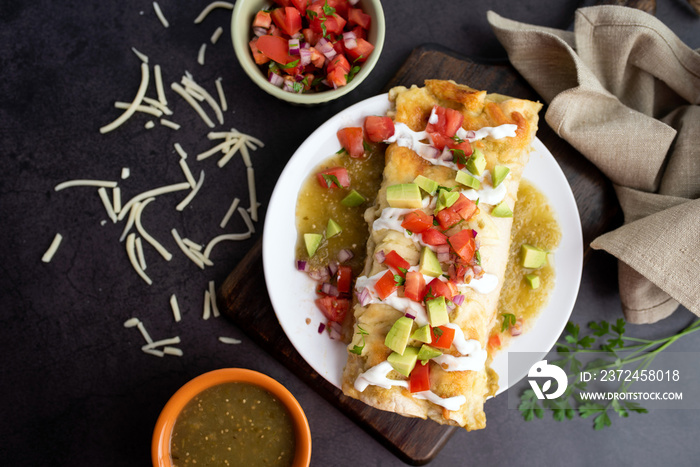 Honey lime chicken enchiladas with toppings