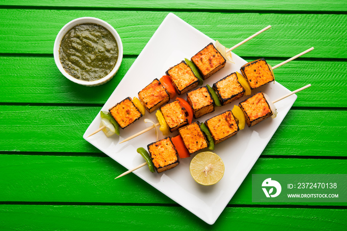 Paneer Tikka Kabab - Tandoori Indian cheese skewers or barbecue paneer, selective focus