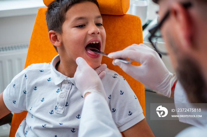 Boy at check-up at aryngologist