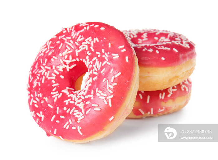 Sweet tasty donuts on white background