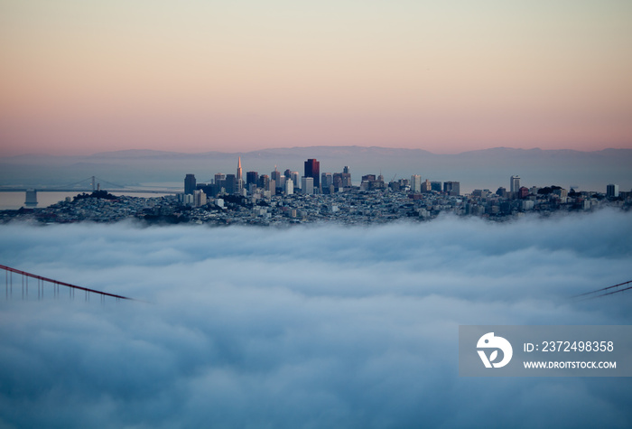 Thick fog covering Golden Gate Bridge.