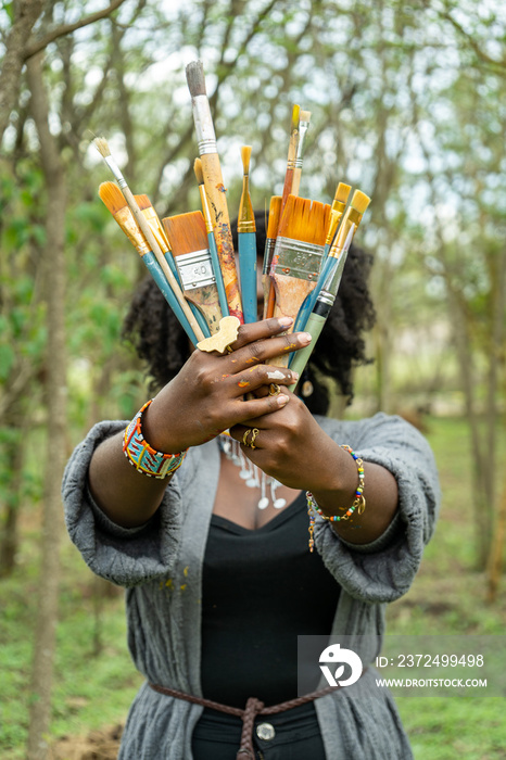 creative portrait of a young female painter