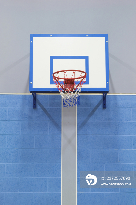 Close up of a basketball hoop mounted on the wall 