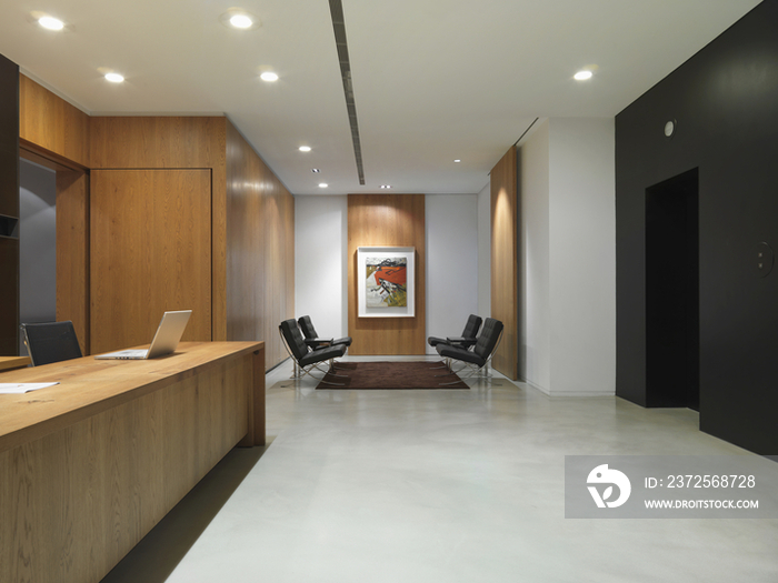 Sitting area by reception desk in office