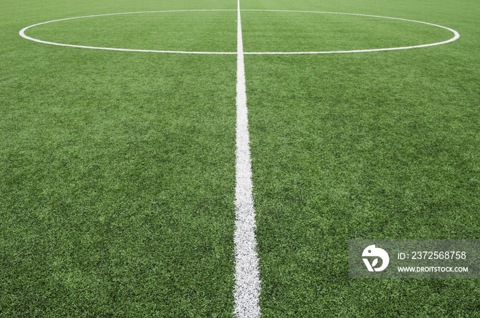 Lines painted on the astro turf sports ground of a modern secondary school