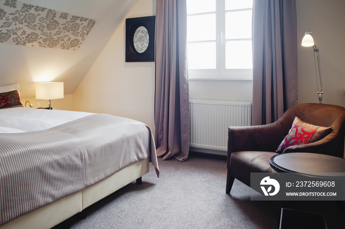 Arm chair in contemporary bedroom