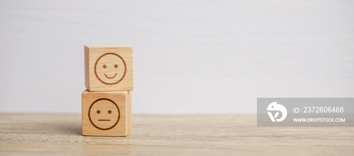 emotion face symbol on wooden blocks. mood, Service rating, ranking, customer review, satisfaction, 