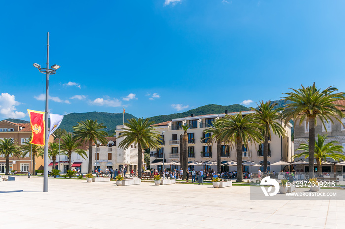 MONTENEGRO, TIVAT - MAY 27/2107: In Porto Montenegro, tourists stroll and rest on the waterfront.